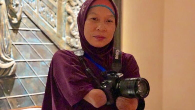 Фотограф, родившаяся без рук, получила премию за любовь к жизни