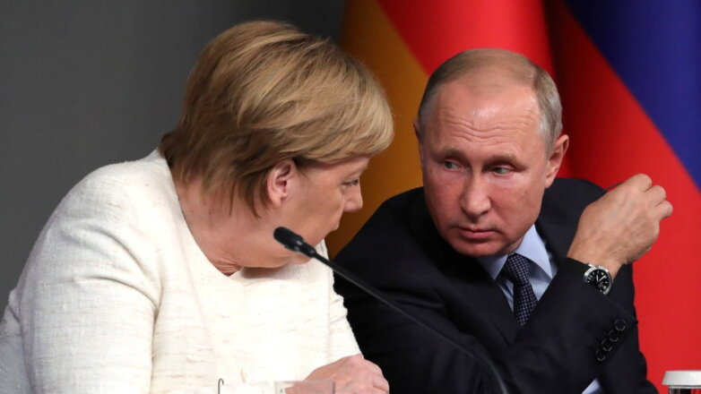Путин и Меркель обсудили необходимость выполнения Минских соглашений