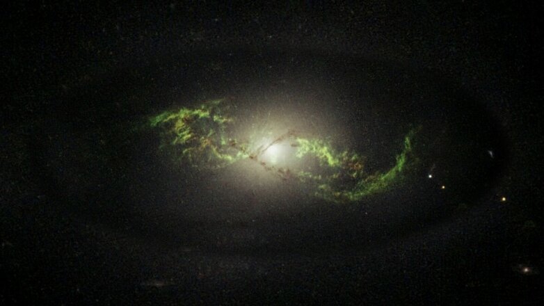 Причину зеленого свечения галактик объяснил астрофизик