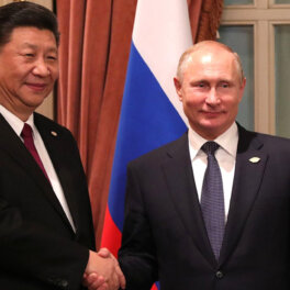 Ушаков назвал успешными переговоры Путина и Си Цзиньпина
