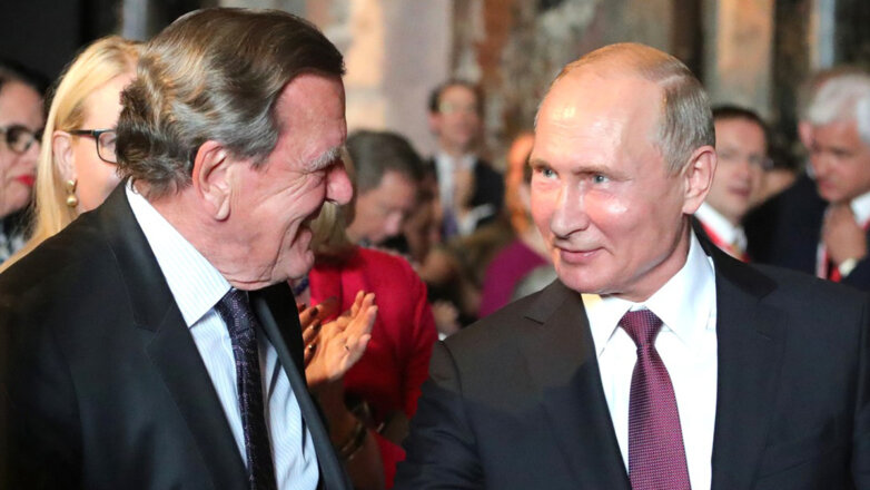 Бывший канцлер Германии Герхард Шредер и президент России Владимир Путин