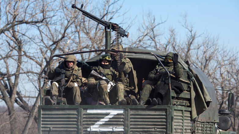 Российские военнослужащие на подъезде к поселку Николаевка