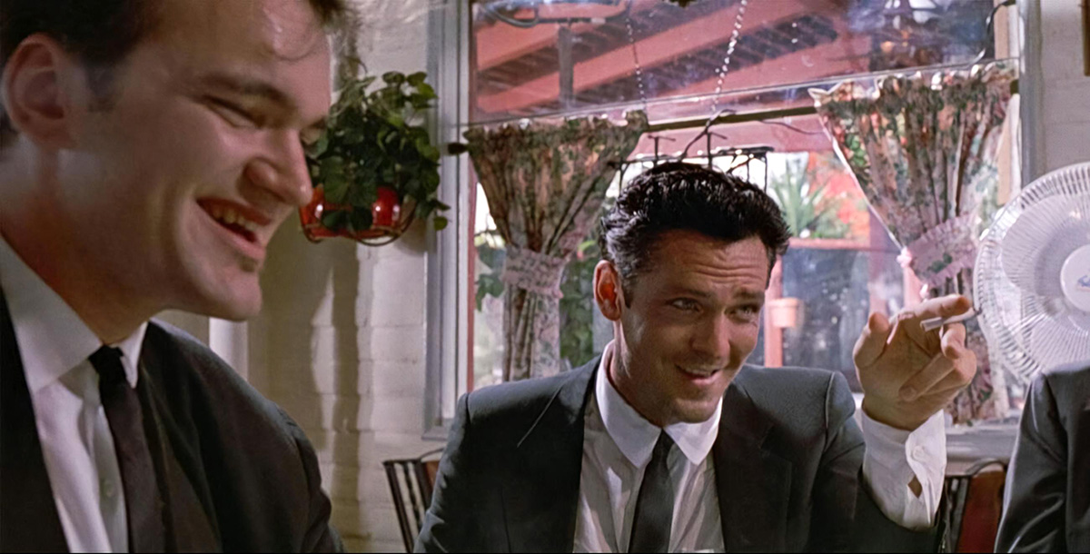 Квентин Тарантино и Майкл Мэдсен в сцене из фильма "Бешеные псы"