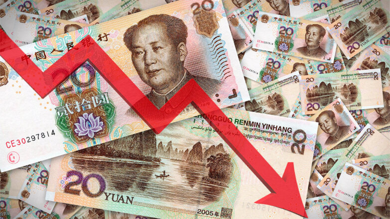 Китайский юань опустился к доллару почти до минимума за шесть месяцев
