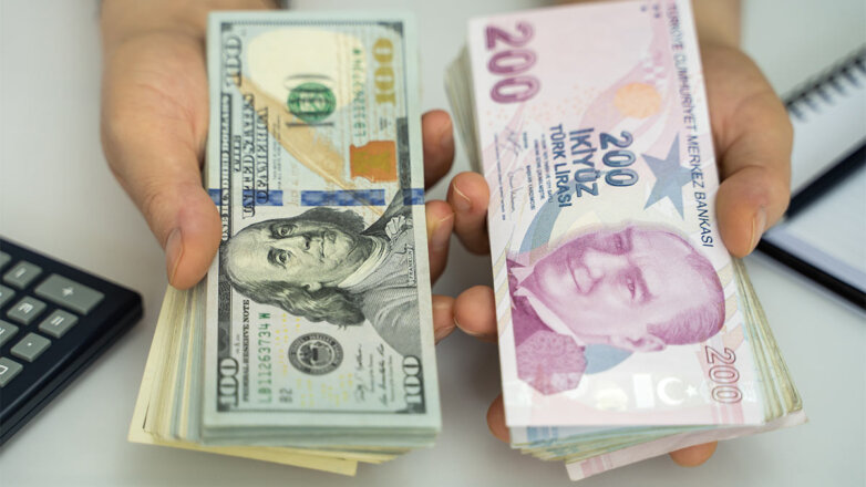 Турецкая лира продолжила падение к доллару после победы Эрдогана