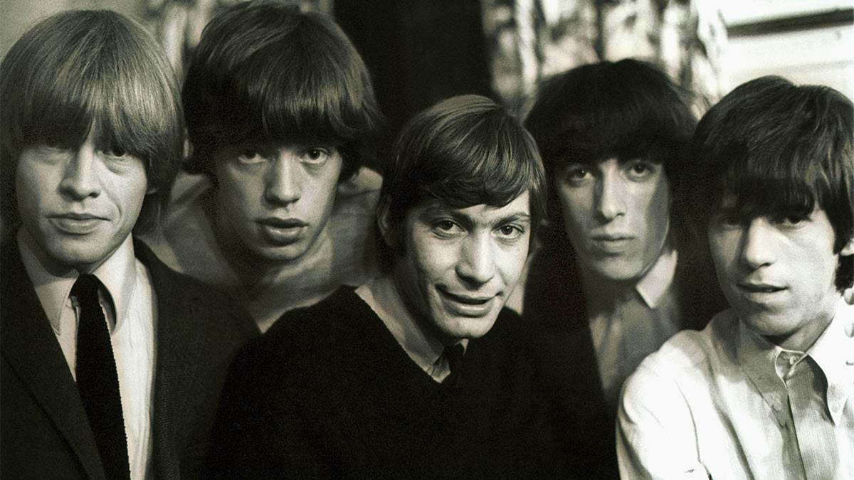 Британский певец Мик Джаггер (второй слева) и группа "The Rolling Stones", 1969 год