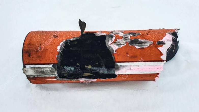 Фрагмент боевого снаряда на месте крушения транспортного самолета Ил-76 ВКС РФ