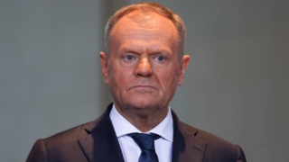 Белан назвал Туска persona non grata в Белом доме